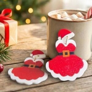 🎄 Get festive with these adorable Santa dress earrings! ✨